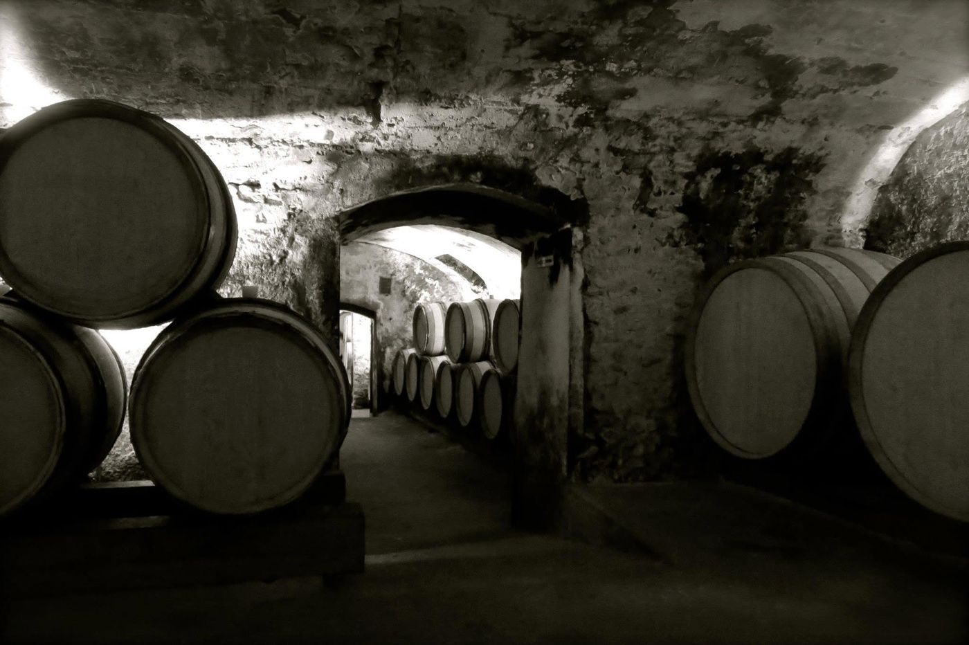 Barrels in a vaulted stone cave